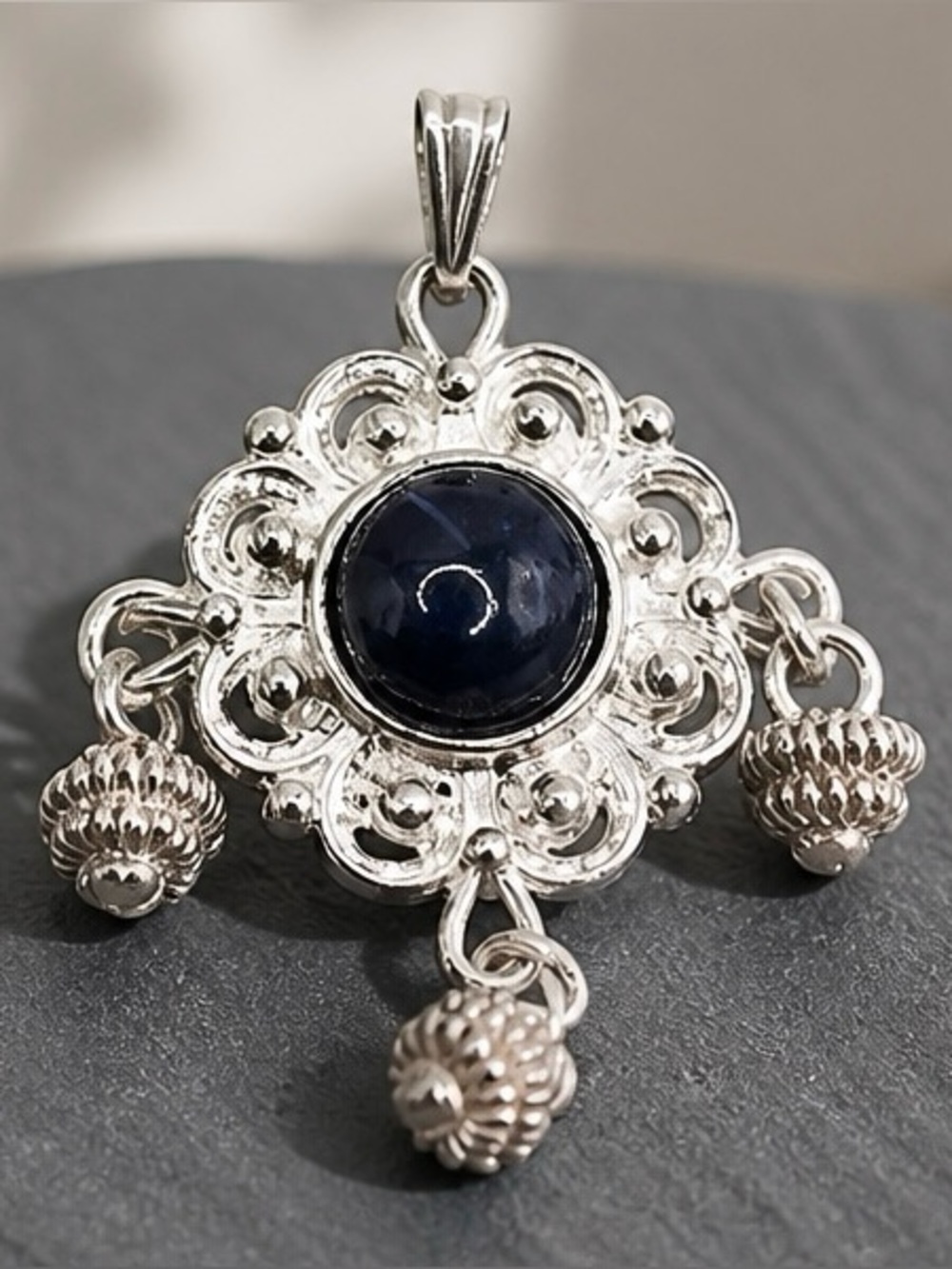 Sterling Silver Pendant with Dark Blue Sodalite Cabochon and Dangle Accents